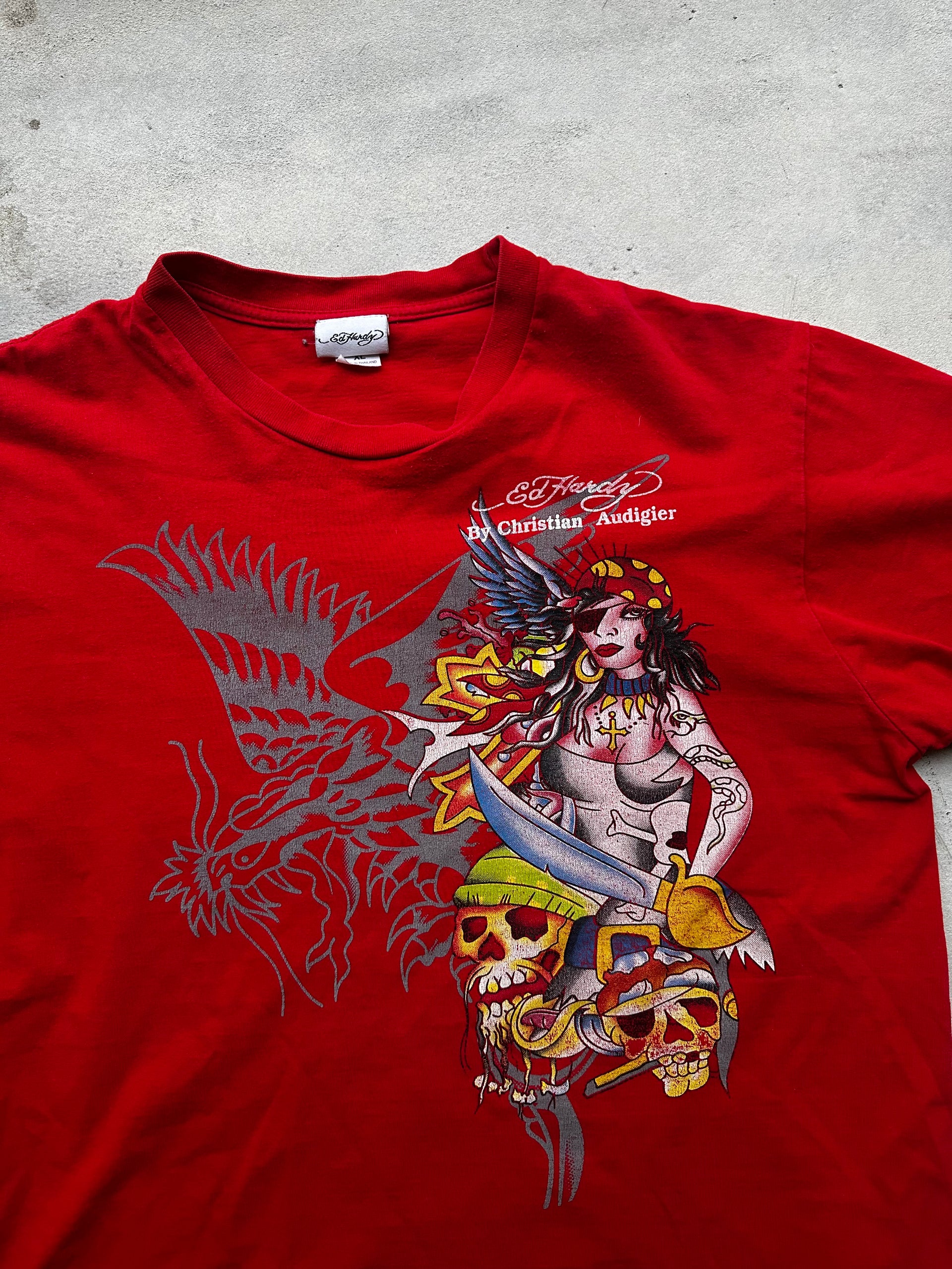 2000s Ed Hardy graphic tee in red with signature bold artwork.