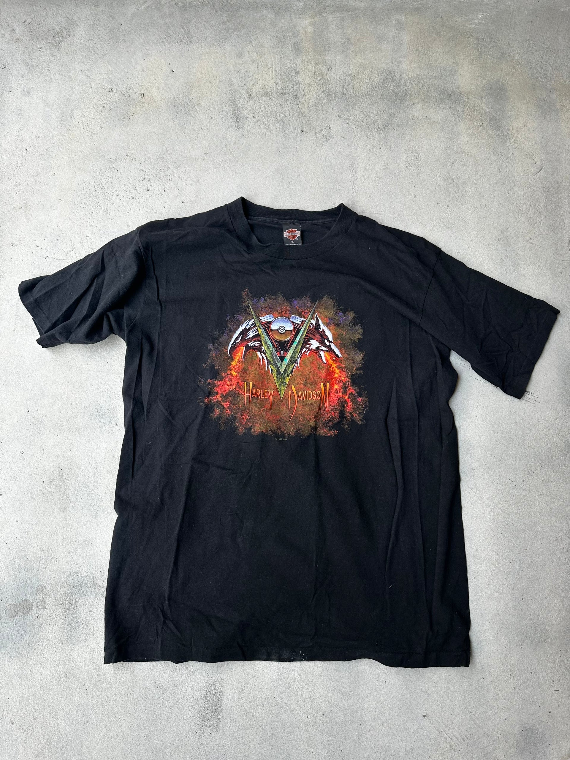 Black biker tee featuring fiery Harley-Davidson print with eagle wings