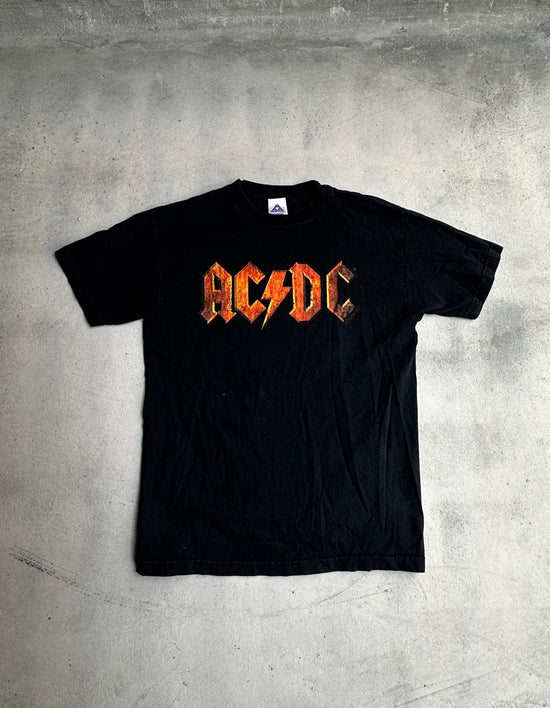 Vintage mid-2000s Delta AC/DC t-shirt featuring the iconic lightning bolt logo.