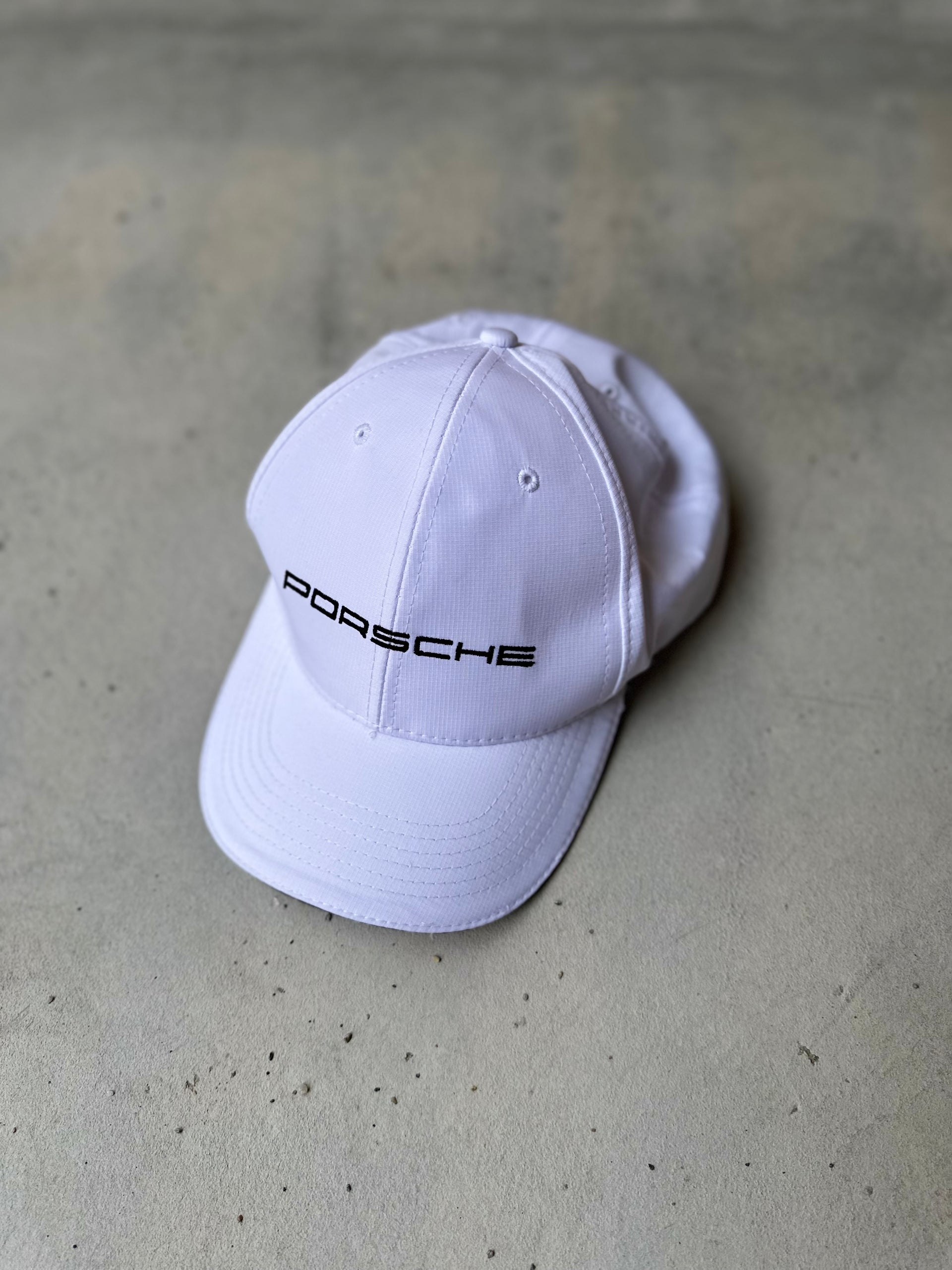 Luxury Porsche merchandise cap, perfect for car enthusiasts and collectors.