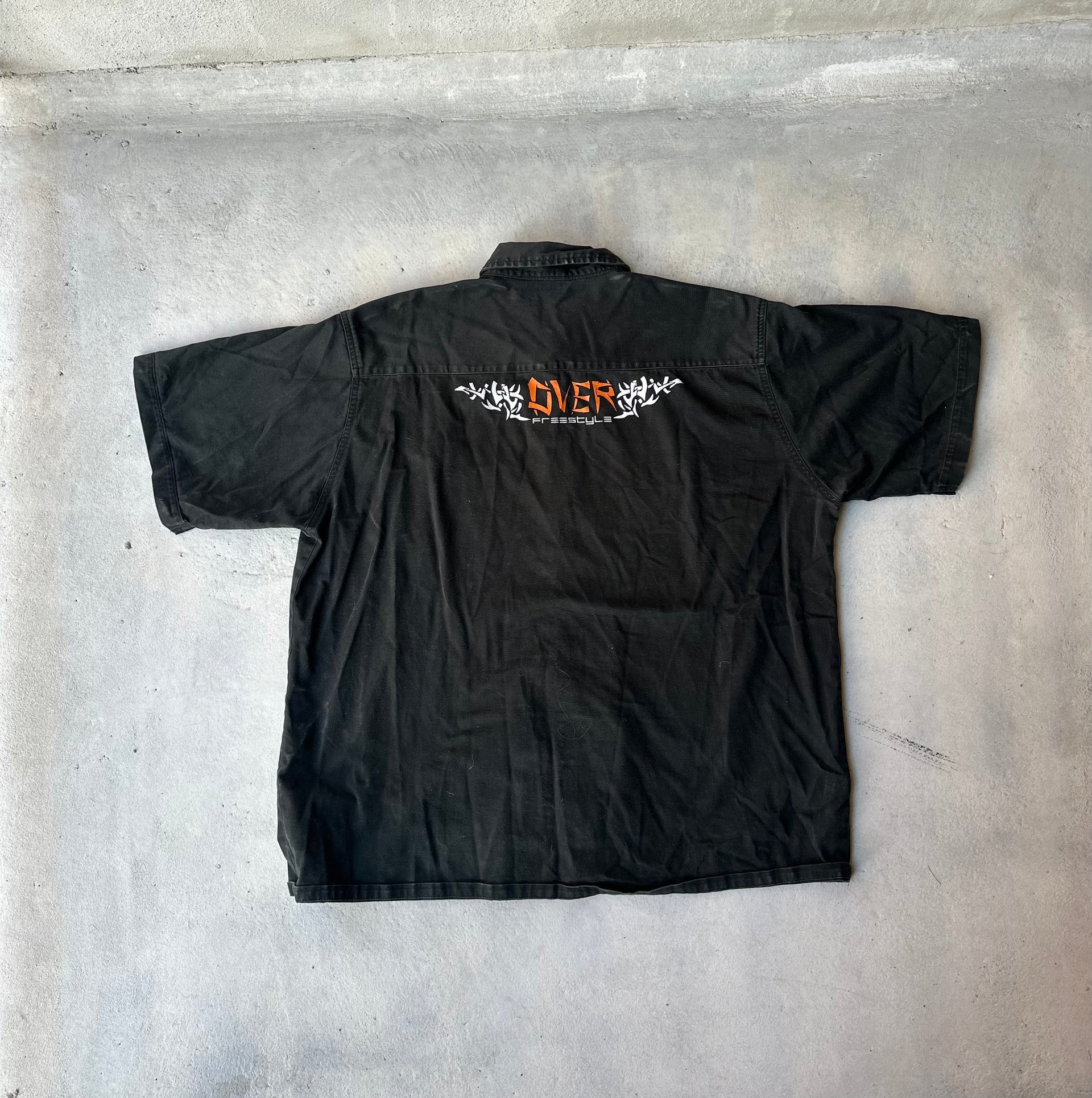Heavy-duty motorcycle shop shirt with Thunder Bike branding.