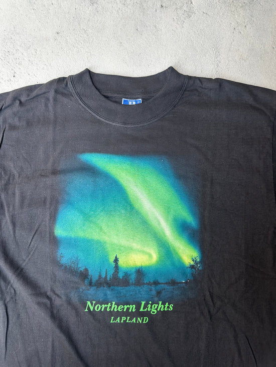 Close-up of Northern Lights print on vintage Lapland graphic T-shirt