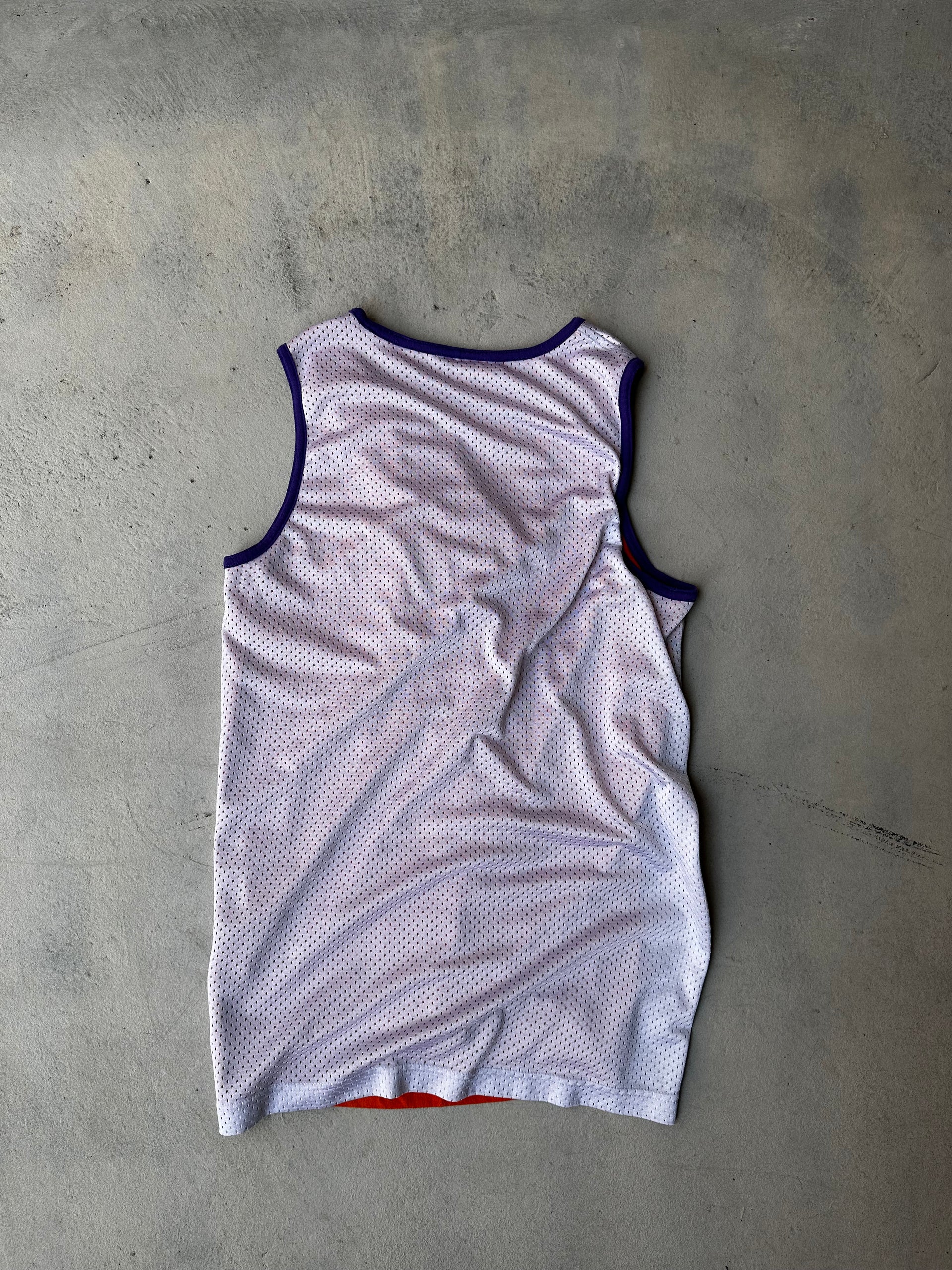 "Laid-flat white and orange Phoenix Suns tank top with retro aesthetic. Showing the back