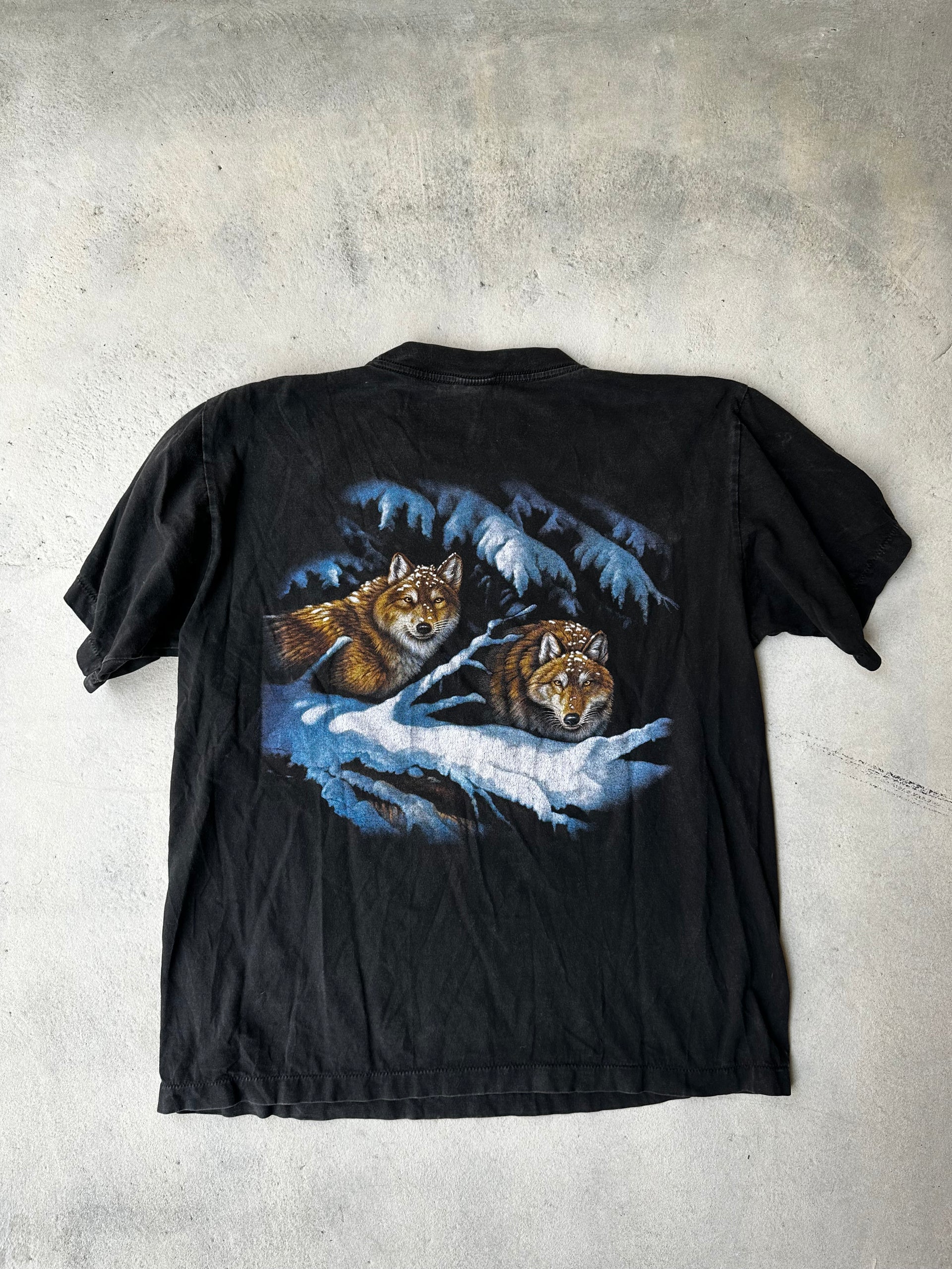 "Rare single stitch wildlife graphic tee with bold colors and rustic aesthetic showing the back of the t-shirt.