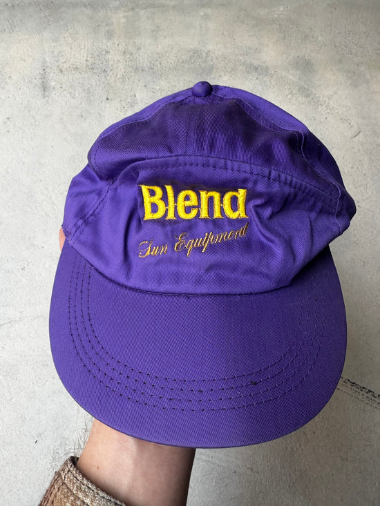 Vintage purple Blend Sun Equipment cap with embroidered yellow logo.
