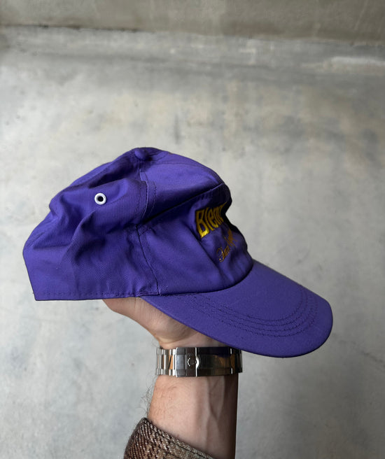 Side view of adjustable purple Blend Sun Equipment cap.