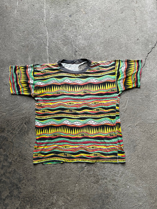 Vintage 1990s Stüssy Rasta graphic t-shirt heavy distressed faded streetwear size S/M