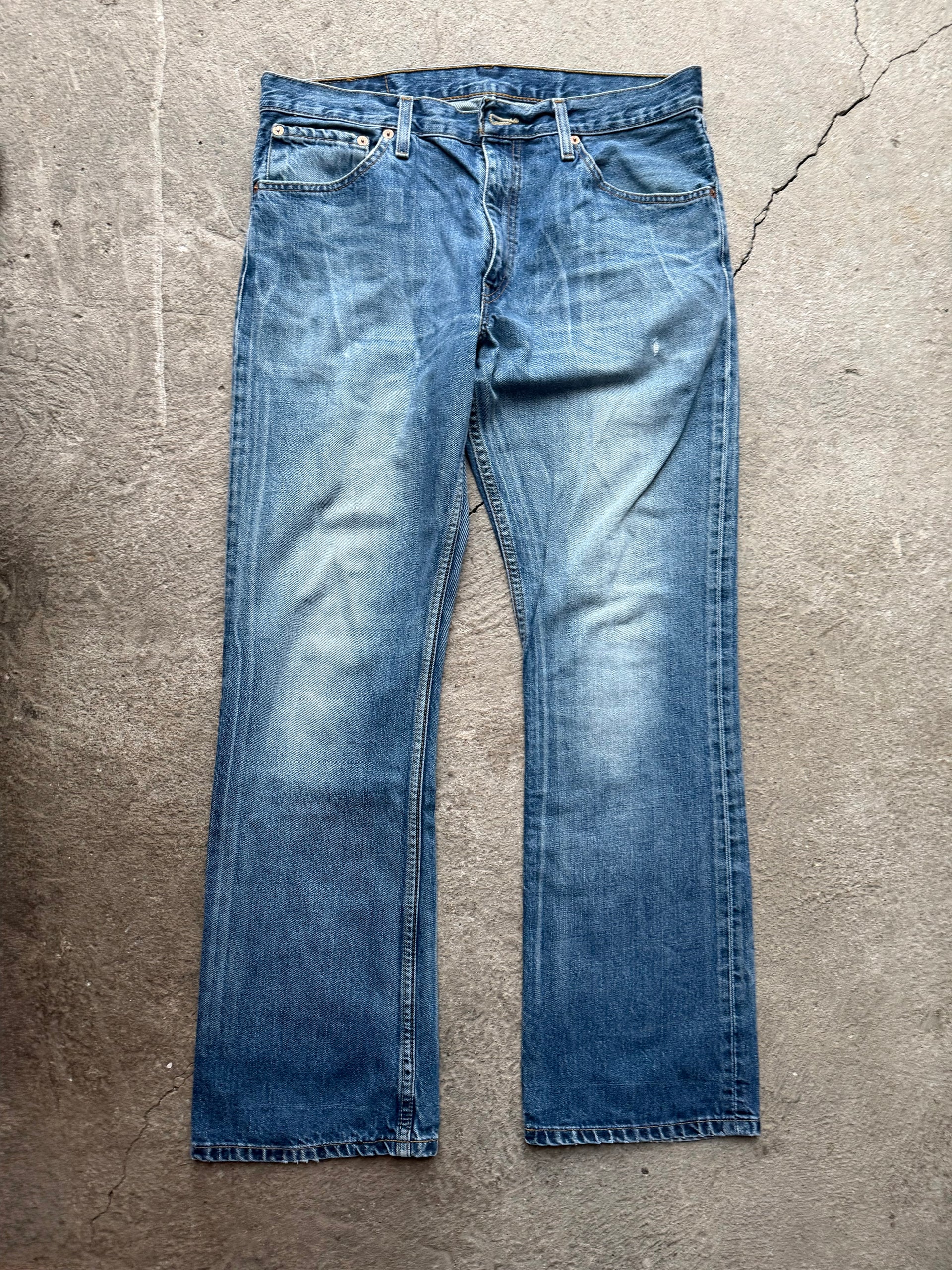 90s Levi’s 507 Faded Mid Blue Jeans | W34 L32