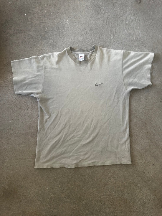 "Vintage early 2000s Nike swoosh logo t-shirt faded beige sportswear size L"