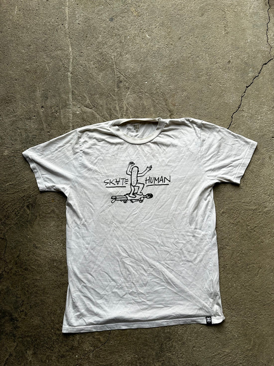 Vintage early 2000s DC Shoes skateboarding t-shirt human graphic faded white size M