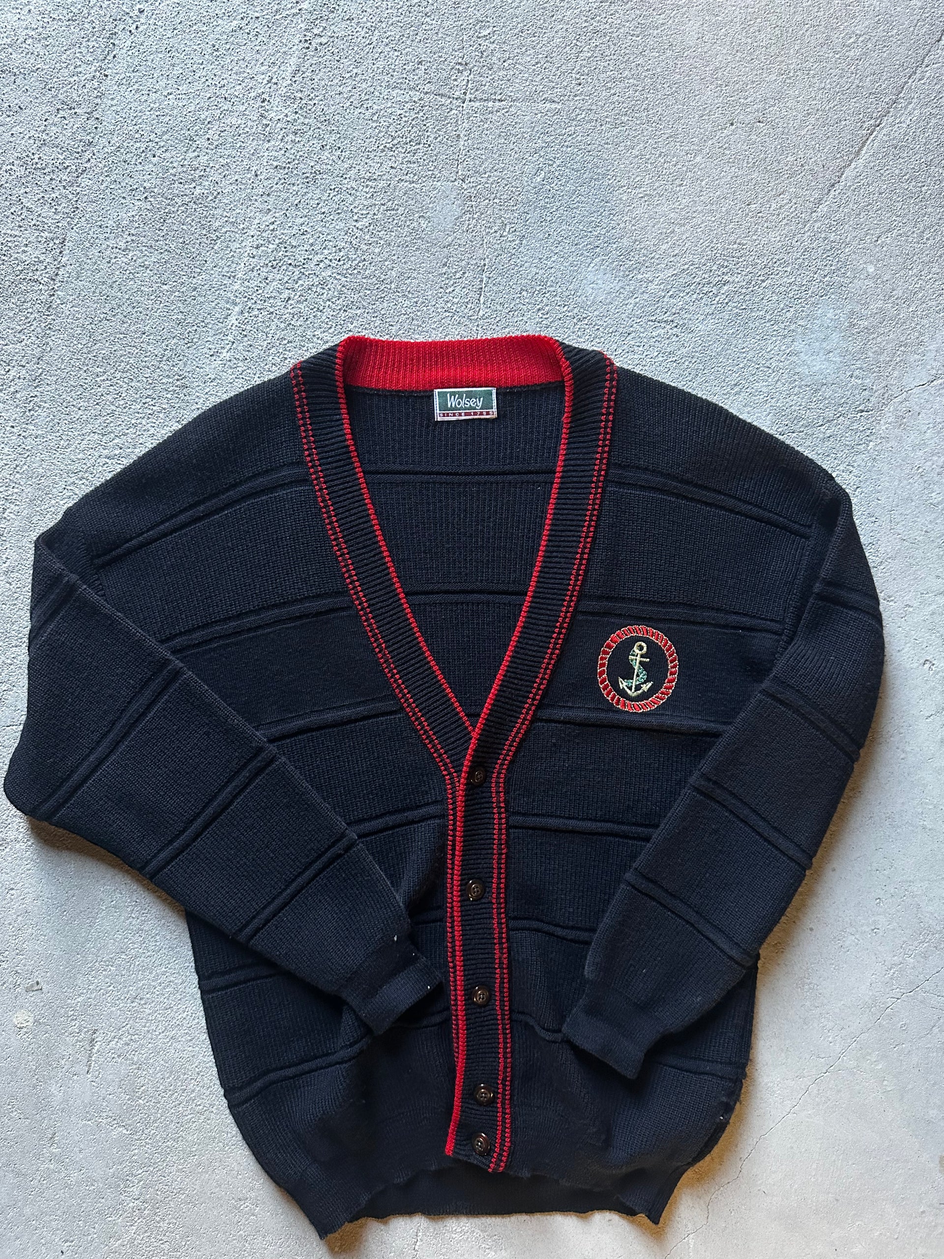 Stickad vintage kofta i marin stil från Wolsey med röd kant och broderat märke