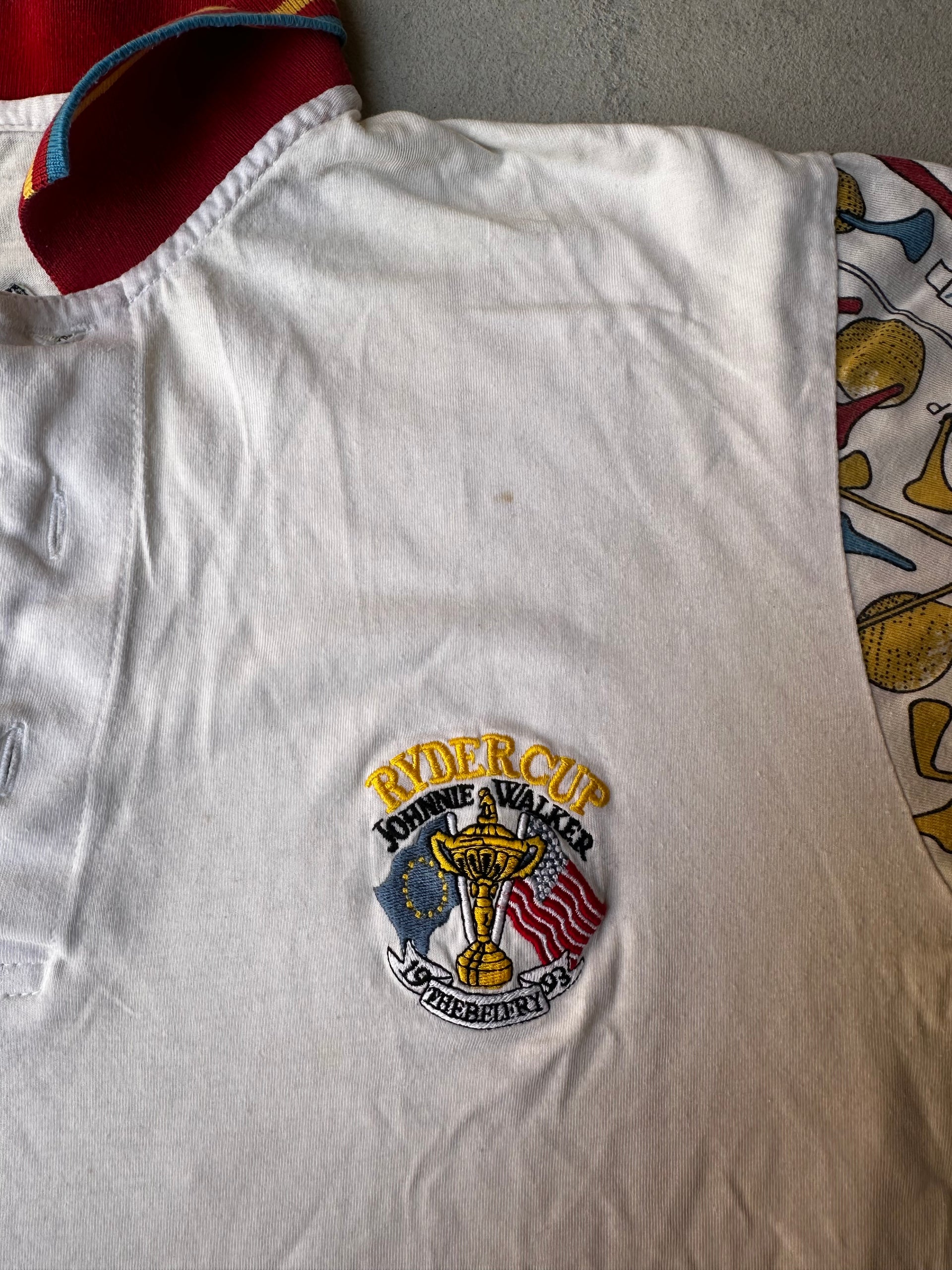 Close-up of Ryder Cup 1993 logo on vintage golf polo shirt