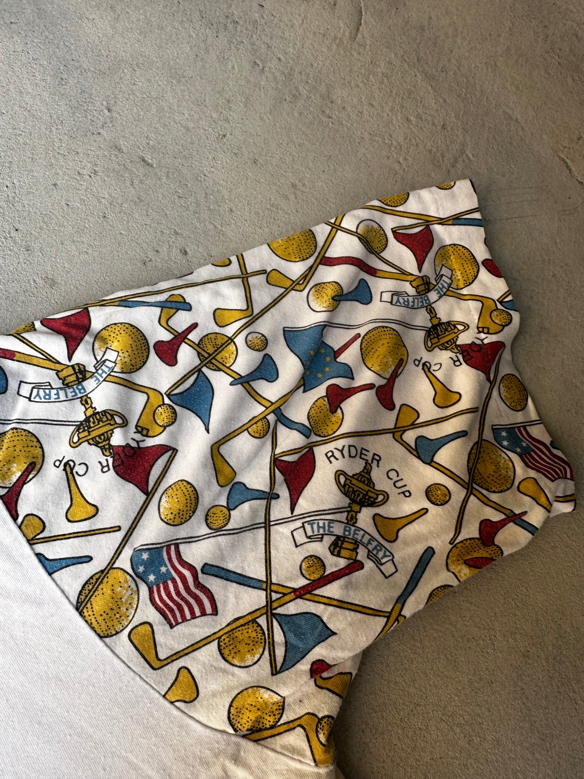 Classic vintage golf polo with bold Ryder Cup graphics on sleeves.