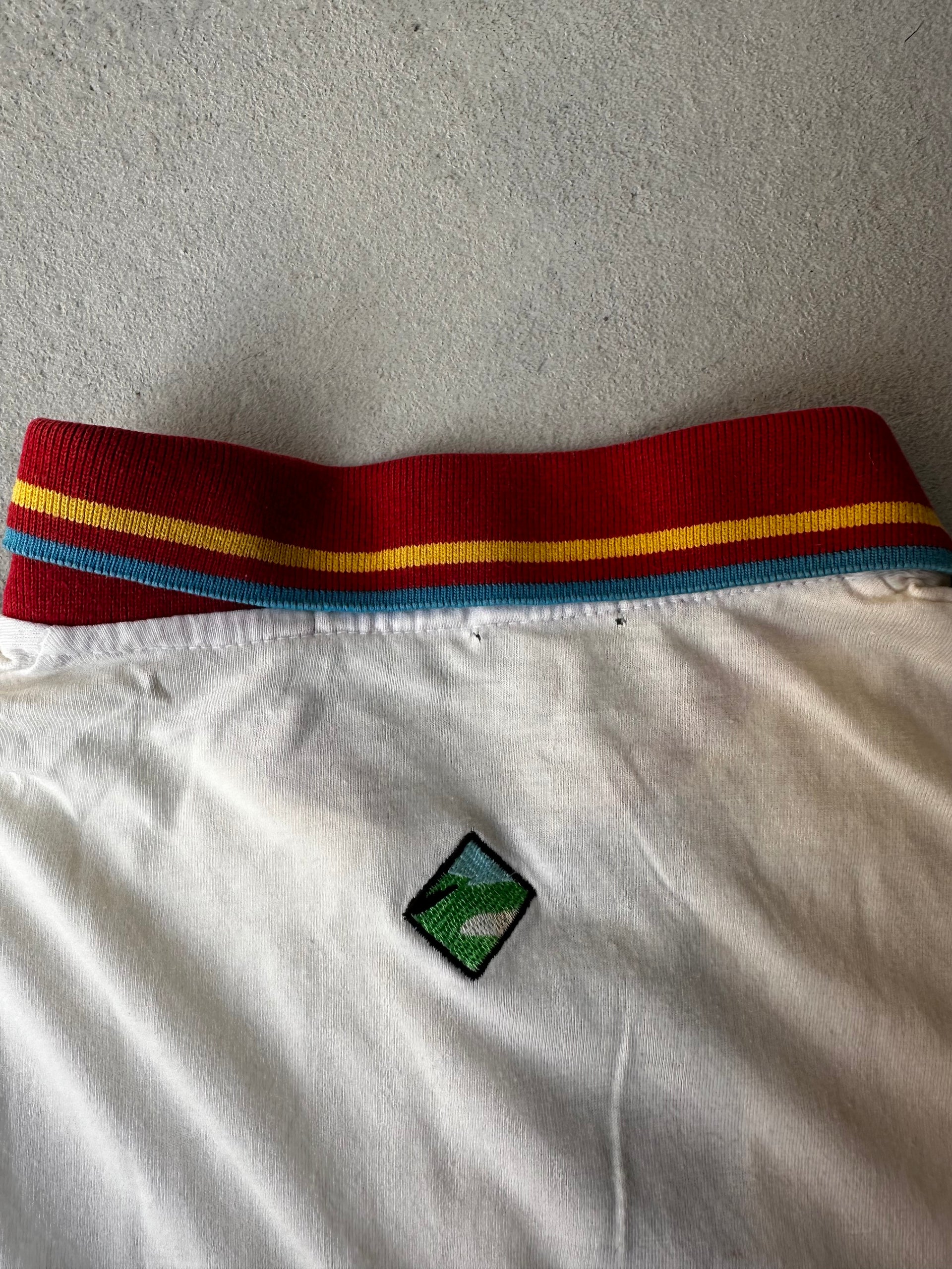 back on Unique Ryder Cup 1993 polo with contrast collar.