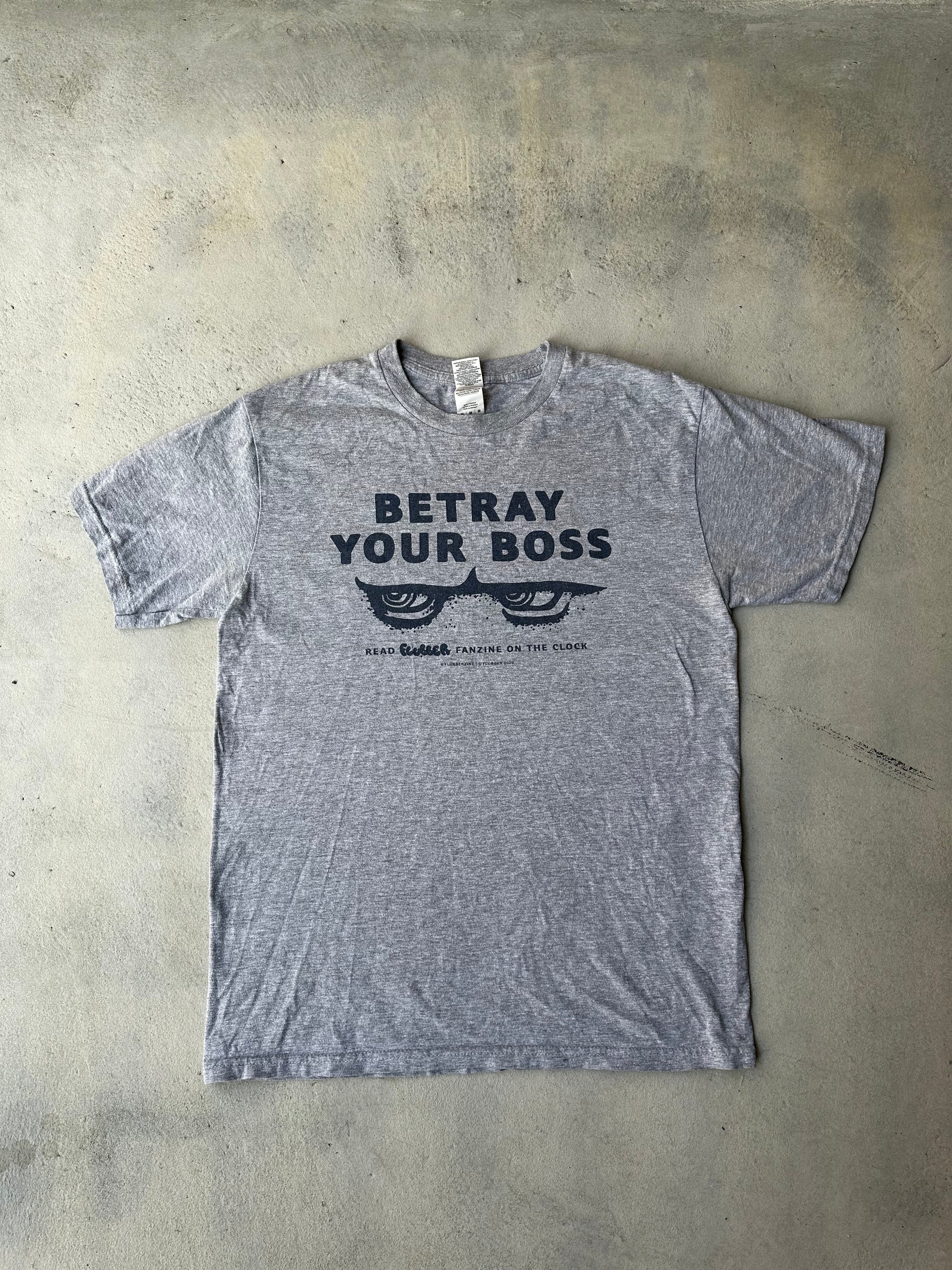 Vintage gray 'Betray Your Boss' graphic T-shirt with black print.