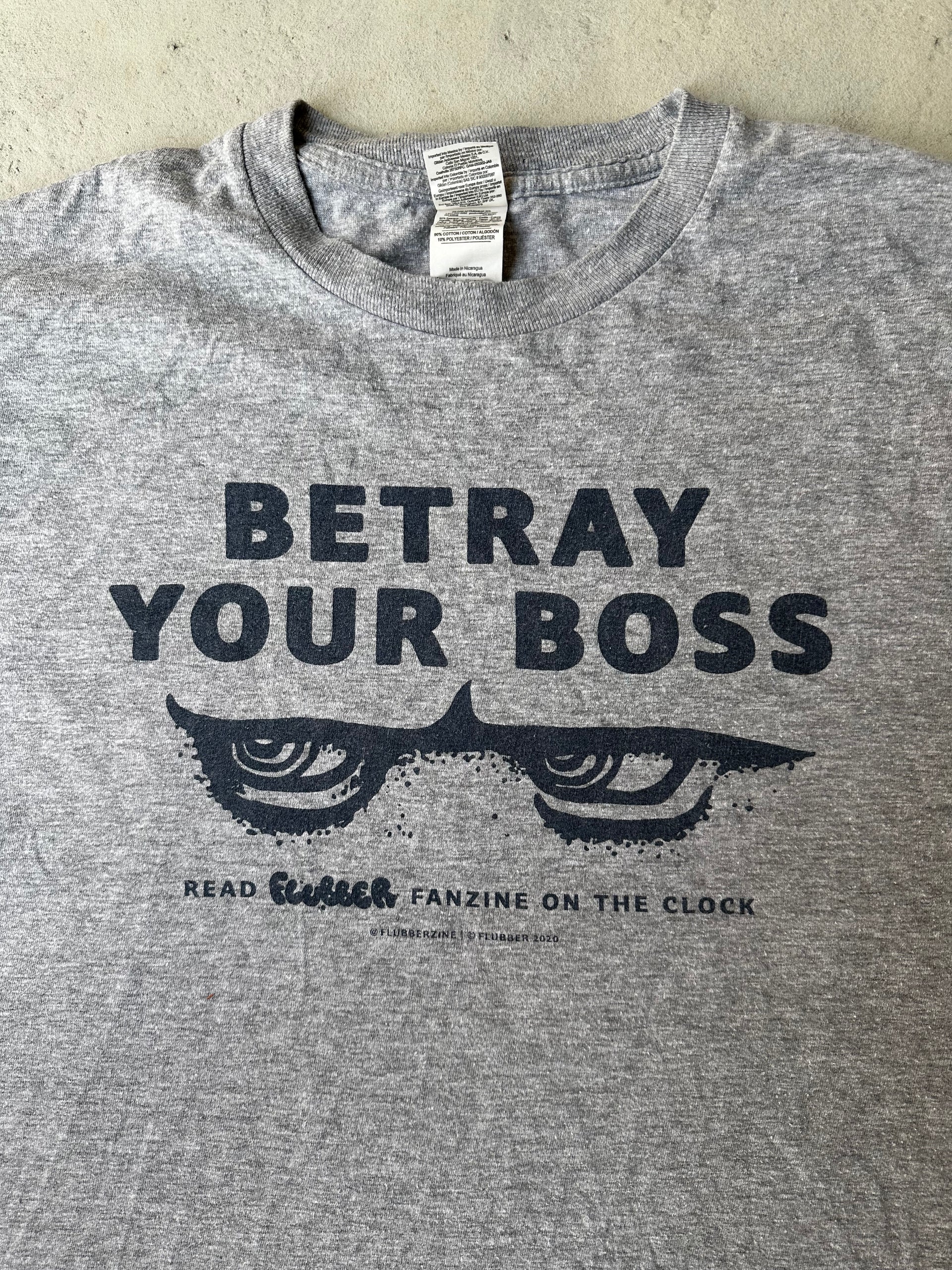 Classic faded heather gray T-shirt with minimalist bold text print.
