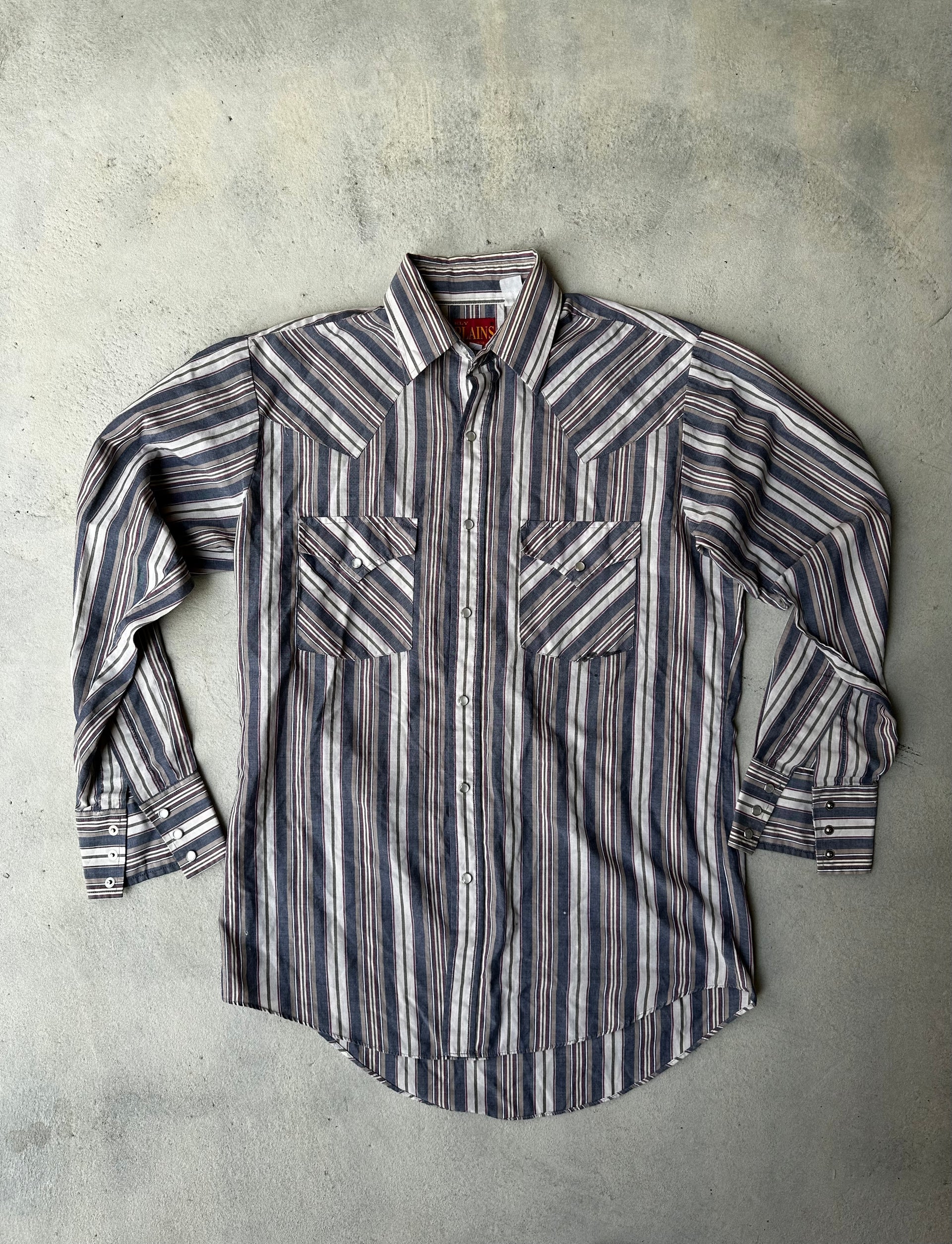Vintage western pearl snap shirt with bold striped pattern in black, white, and gray.