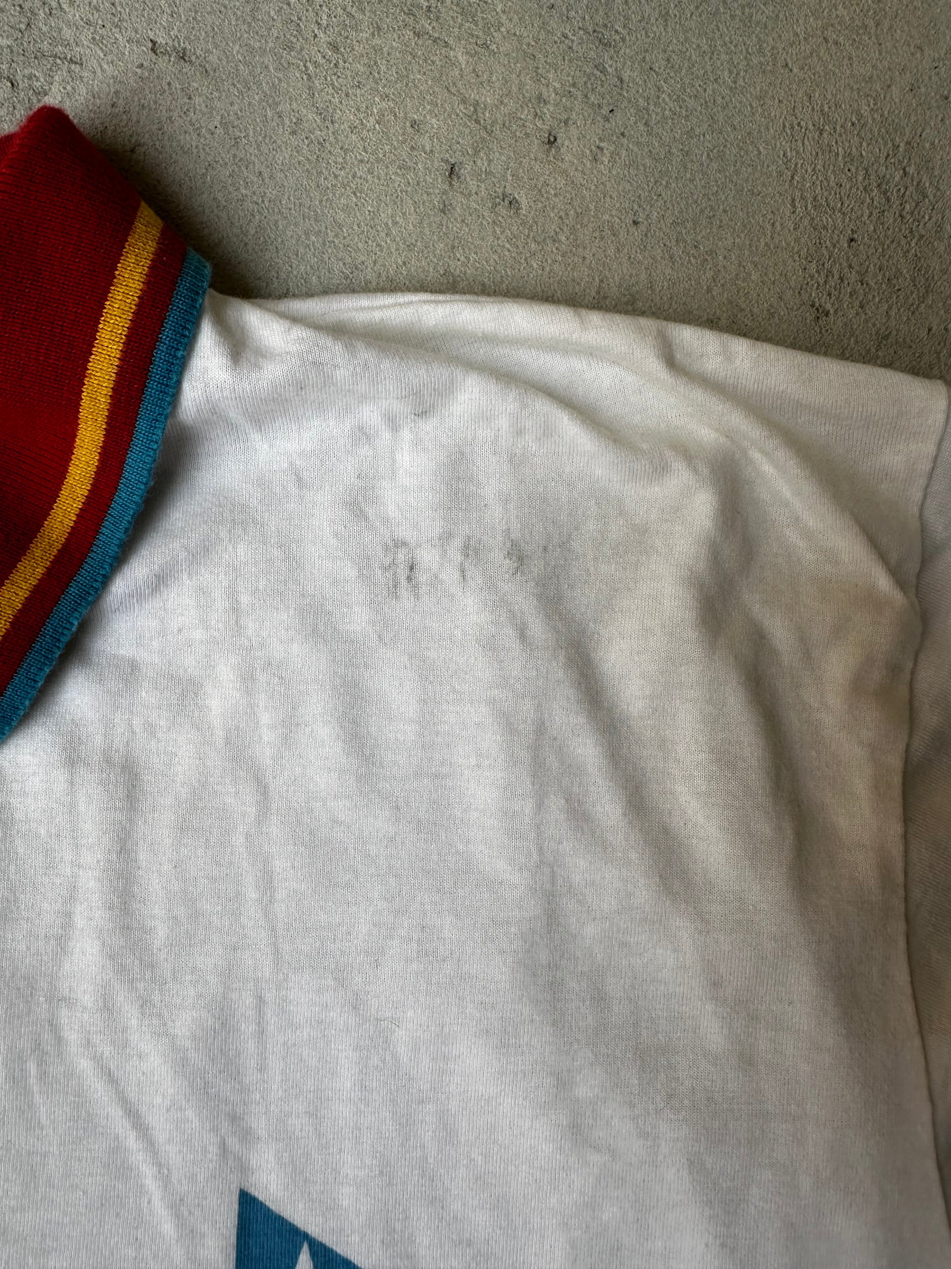Close-up of minor stains on the right shoulder of vintage Ryder Cup 1993 polo shirt